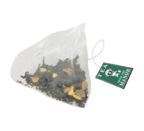Pyramid teabag and Chai Spice tea blend with Tea From The Manor logo