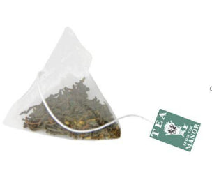 Pyramid teabag containing Earl Grey Tea with Tea From The Manor logo